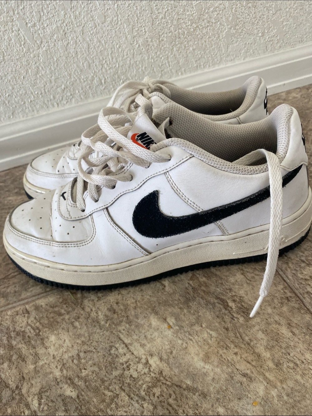 Nike Air Force 1 White Sneakers with Black Swoosh